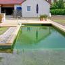 Schwimmteich mit Holzdeck